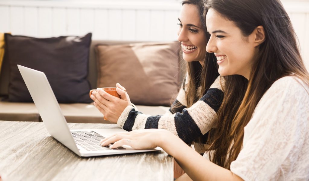 Female friends studying at the local coffee shop